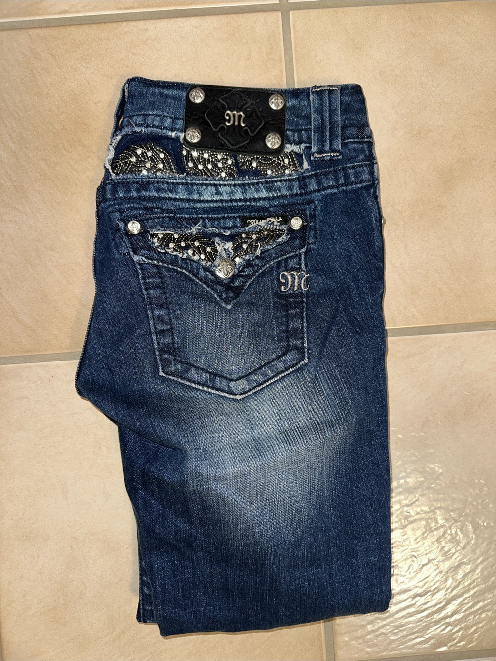 Miss Me Dark Blue Cropped Jeans with yEmbellished Back Pockets. New never worn.